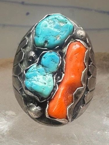 NAVAJO RING TURQUOISE CORAL BAND SIZE 9 STERLING SILVER WOMEN MEN: NAVAJO RING TURQUOISE CORAL BAND SIZE 9 STERLING SILVER WOMEN MEN Navajo ring Turquoise Coral band Size 9 sterling silver women men Size 9 Weight 20.2g Length 1 1/8" Width 5/8 " Thinnest part of band.