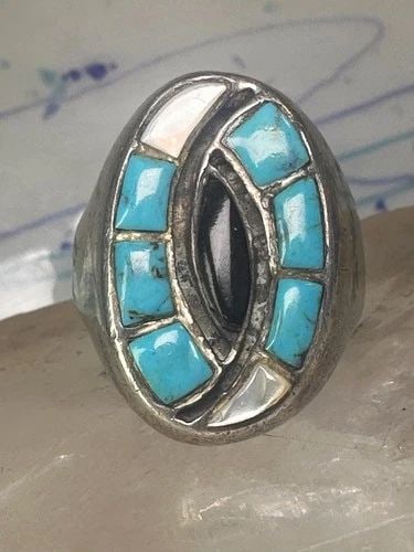 NAVAJO RING: NAVAJO RING Navajo ring hummingbird turquoise mop onyx ring size 11 sterling silver women men Size 11 Weight 22.4g Length 1 1/8" Width 5/8" Thinnest part of band. 3/16"
