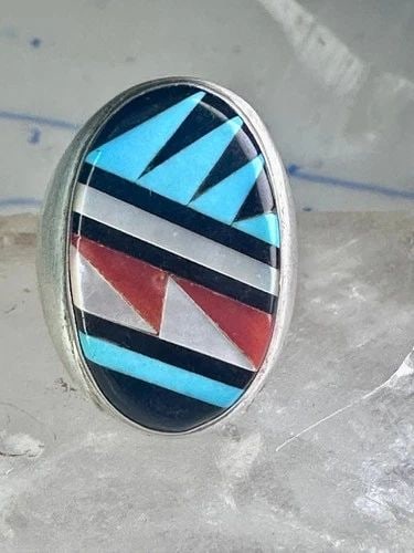 ZUNI RING TURQUOISE CORAL MOP ONYX BAND SIZE 8.25 STERLING SILVER WOMEN MEN: ZUNI RING TURQUOISE CORAL MOP ONYX BAND SIZE 8.25 STERLING SILVER WOMEN MEN Zuni ring Turquoise coral MOP Onyx band size 8.25 sterling silver women men Size 8.25 Weight 17.7g Length 1" Width 5/8" Thin