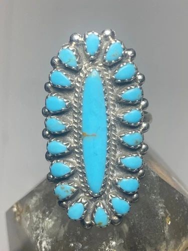TURQUOISE RING SIZE 7.25 ZUNI LONG PETITE POINT SOUTHWEST STERLING SILVER WOMEN: TURQUOISE RING SIZE 7.25 ZUNI LONG PETITE POINT SOUTHWEST STERLING SILVER WOMEN Turquoise ring Zuni long Petite point southwest sterling silver women Size 7.25 Weight 5.9g Length. 1. 3/8" Width. 3/4" 