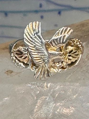 BLACK HILLS GOLD RING SIZE 7.5 EAGLE LEAVES BAND STERLING SILVER WOMEN: BLACK HILLS GOLD RING SIZE 7.5 EAGLE LEAVES BAND STERLING SILVER WOMEN Black Hills Gold ring size 7.5 Eagle leaves band sterling silver women Size 7.5 Weight 3.6g Width. 5/8" Thinnest part of band 1/8