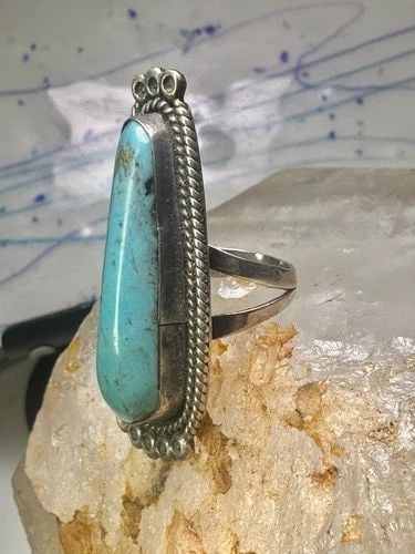 LONG NAVAJO RING TURQUOISE ROPE DESIGN BAND SIZE 7.5 STERLING SILVER WOMEN: LONG NAVAJO RING TURQUOISE ROPE DESIGN BAND SIZE 7.5 STERLING SILVER WOMEN Long Navajo ring Turquoise rope design band size 7.5 sterling silver women Size 7.5 Weight 5g Length 2" Width 3/4" Thinnest p
