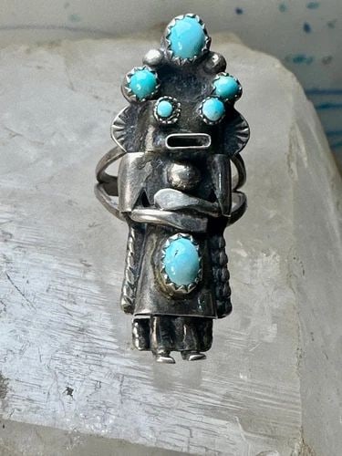 KACHINA RING SIZE 5.75 NAVAJO TURQUOISE STERLING SILVER WOMEN MEN: KACHINA RING SIZE 5.75 NAVAJO TURQUOISE STERLING SILVER WOMEN MEN Kachina Ring size 5.75 Navajo turquoise sterling silver women men Size 5.75 Weight 6.2g Length 1 1/2" Width 1/2" Thinnest part of band