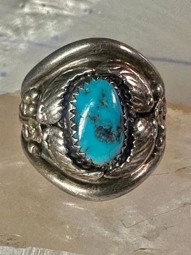 NAVAJO RING TURQUOISE BAND SIZE 11.25 BAND STERLING SILVER MEN WOMEN: NAVAJO RING TURQUOISE BAND SIZE 11.25 BAND STERLING SILVER MEN WOMEN Navajo ring turquoise leaves band size 11.25 band sterling silver men women Size 11.25 Weight 11.4g Length 1" Width 3/8" Thinnest p