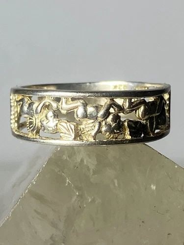 CHERUB RING SIZE 8.50 CUPID BLACK HILLS GOLD STERLING SILVER 12K WOMEN GIRLS: CHERUB RING SIZE 8.50 CUPID BLACK HILLS GOLD STERLING SILVER 12K WOMEN GIRLS Cherub ring cupid Black Hills Gold sterling silver 12K women girls Detailed w 12K Signed Hard to read Size 8.50 Between a s