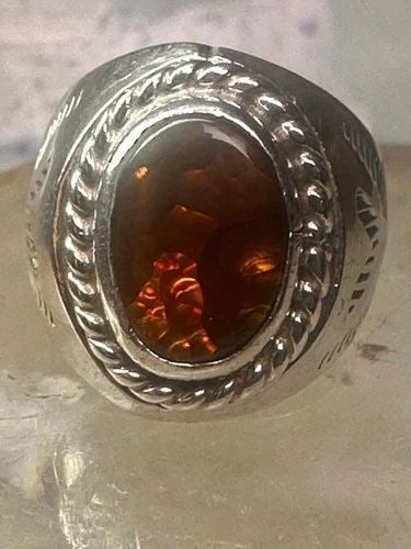FIRE AGATE RING NAVAJO BAND SIZE 8.50 STERLING SILVER WOMEN MEN: FIRE AGATE RING NAVAJO BAND SIZE 8.50 STERLING SILVER WOMEN MEN Fire Agate ring Navajo band size 8.50 sterling silver women men Size 8.50 Weight. 10g Length 5\7/8" Width. 3/8" Thinnest part of band 1/