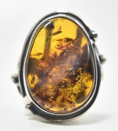 AMBER RING VINTAGE STERLING SILVER ART DECO SIZE 7.75: AMBER RING VINTAGE STERLING SILVER ART DECO SIZE 7.75 Amber Ring Vintage Sterling Silver Influenced by Arts & Crafts Movement Size 7.75 Weight 13.9g Length 1 1/4" Width 7/8"