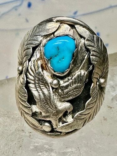 NAVAJO RING SIZE 14.25 EAGLE TURQUOISE NATIVE AMERICAN STERLING SILVER: NAVAJO RING SIZE 14.25 EAGLE TURQUOISE NATIVE AMERICAN STERLING SILVER May have been resized strcturally sound Size 14.25 Between a size 14.25 and a size 14.50 Weight 13.3g Length. 1 1/4" Thinnest par