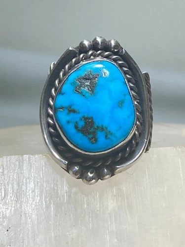 TURQUOISE RING NAVAJO STERLING SILVER WOMEN MEN: TURQUOISE RING NAVAJO STERLING SILVER WOMEN MEN Turquoise ring southwest sterling silver women men Size. 10.50 Between a size 10.50 and a size 10.75 Weight 23g Length. 1. 3/8" Width 3/4" Thinnest part
