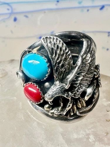 EAGLE RING TURQUOISE CORAL NAVAJO SIZE 13.50 SIGNED A STERLING SILVER MEN: EAGLE RING TURQUOISE CORAL NAVAJO SIZE 13.50 SIGNED A STERLING SILVER MEN Eagle ring turquoise coral Navajo size 13.50 signed A sterling silver men Size 13.50 Weight 20.2g Length 1 1/8" Thinnest part 