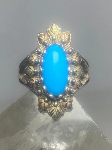 BLACK HILLS GOLD RING TURQUOISE STERLING SILVER FLORAL BAND PINKY WOMEN GIRLS: BLACK HILLS GOLD RING TURQUOISE STERLING SILVER FLORAL BAND PINKY WOMEN GIRLS Black Hills Gold Ring turquoise sterling silver floral band pinky women girls Signed CCO 12K Size 7 Weight 5.9g Length 1" 
