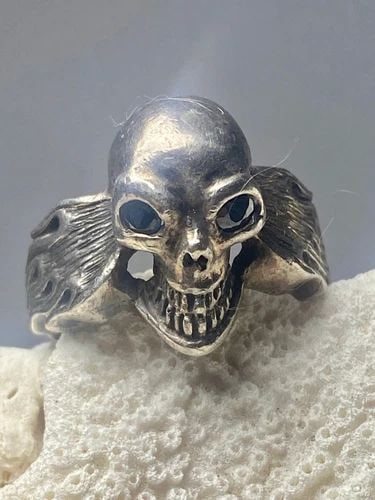 SKULL RING SIZE 8.75 BIKER FLAMES BAND STERLING SILVER WOMEN MEN: SKULL RING SIZE 8.75 BIKER FLAMES BAND STERLING SILVER WOMEN MEN Skull ring size 8.75 biker flames band w blue eyes sterling silver women men Size 8.75 Weight 11.9g Widest 3/4" Thinnest part 1/8"