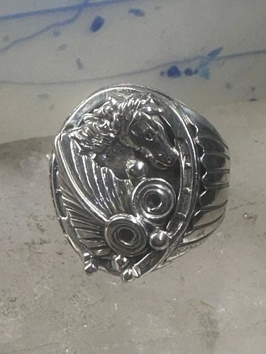HORSESHOE RING SOUTHWEST HORSE SIZE 9.75 STERLING SILVER WOMEN MEN: HORSESHOE RING SOUTHWEST HORSE SIZE 9.75 STERLING SILVER WOMEN MEN Horseshoe ring Southwest horse size 9.75 sterling silver women men Please see photos Size 9.75 Weight 22.2g Length 1 1/8" Width 3/4" 