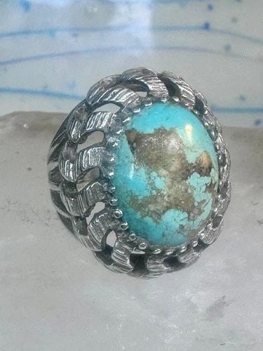 BRUTALIST RING TURQUOISE SIZE 7 STERLING SILVER MEXICAN BAND WOMEN: BRUTALIST RING TURQUOISE SIZE 7 STERLING SILVER MEXICAN BAND WOMEN Turquoise ring brutalist band leaves Mexico size 6.75 sterling silver women men Size 6.75 Between a size 6.75 and a size 7 Weight. 12