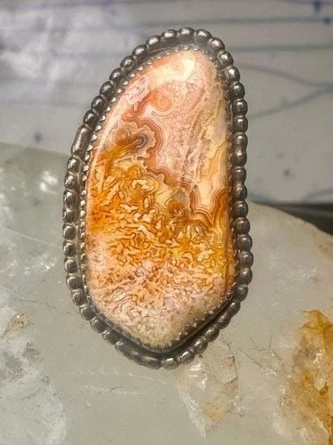 PETRIFIED WOOD RING NAVAJO SIZE 7.25 STERLING SILVER WOMEN: PETRIFIED WOOD RING NAVAJO SIZE 7.25 STERLING SILVER WOMEN Petrified wood ring Navajo size 7.25 sterling silver women Size 7.25 Between a size 7.25 and a size 7.50 Weight 9.9g Length 1. 3/8" Width 3/4