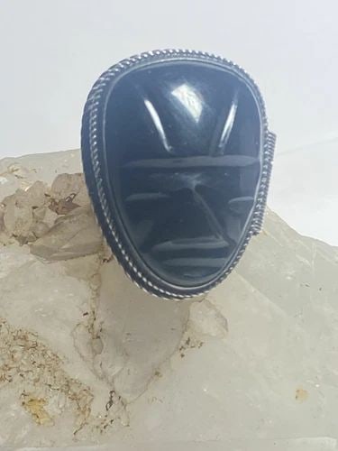 POISON RING BLACK ONYX FACE STERLING SILVER WOMEN GIRLS: POISON RING BLACK ONYX FACE STERLING SILVER WOMEN GIRLS Poison ring mask black onyx face sterling silver women girls Size 5.75 Between a size 5.75 and a size 6 Weight 16.2g Length. 1. 1/2" Width. 1. 1