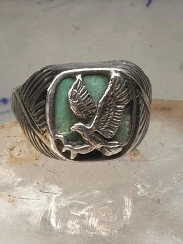 EAGLE RING SOUTHWEST TURQUOISE BAND SIZE 13.2 STERLING SILVER MEN WOMEN: EAGLE RING SOUTHWEST TURQUOISE BAND SIZE 13.2 STERLING SILVER MEN WOMEN Eagle Ring Wm Wheeler Turquoise band size 13.2 sterling silver men women Size 13.2 Weight 11.5g Length. 3/4" Width 1/2" Thinnest