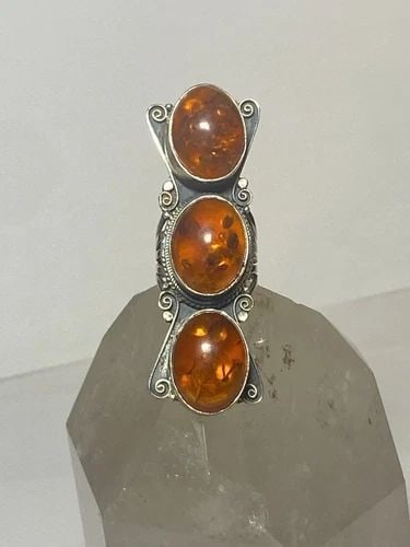 LONG AMBER RING SOUTHWEST STERLING SILVER BAND WOMEN: LONG AMBER RING SOUTHWEST STERLING SILVER BAND WOMEN long amber ring southwest sterling silver band women Size 7.25 Weight 31.7g Length 2. 1/2" Width 7/8" Thinnest part of band 3/16"