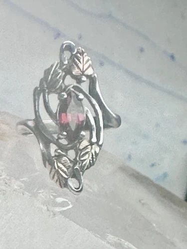 LONG BLACK HILLS GOLD RING GARNET LEAVES FLORAL SIZE 4.50 STERLING SILVER WOMEN: LONG BLACK HILLS GOLD RING GARNET LEAVES FLORAL SIZE 4.50 STERLING SILVER WOMEN Long Black Hills Gold ring garnet leaves floral size 4.50 sterling silver women Size 4.50 Weight 3.6g Length 1" Width 1/