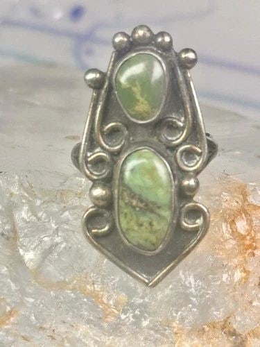 NAVAJO RING GREEN TURQUOISE SIZE 5.5 STERLING SILVER WOMEN GIRLS: NAVAJO RING GREEN TURQUOISE SIZE 5.5 STERLING SILVER WOMEN GIRLS Navajo Ring green turquoise size 5.5 sterling silver women girls Size 5.50 Weight 5.4g Length 1 1/4" Width 5/8" Thinnest part of band 1