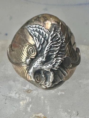 NAVAJO EAGLE RING SIZE 12 STERLING SILVER WOMEN MEN (UNKNOWN GOLD OVER FEATHERS): NAVAJO EAGLE RING SIZE 12 STERLING SILVER WOMEN MEN (UNKNOWN GOLD OVER FEATHERS) Navajo Eagle ring size 12 sterling silver women men (unknown gold over feathers) Size 12 Weight. 22.1g Length 1" Width 