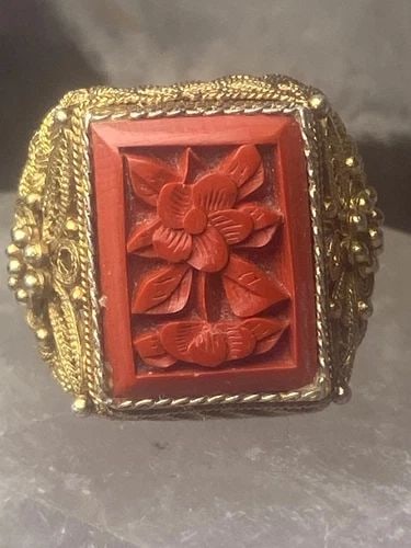 CINNABAR FLORAL RING SIZE 5.50 STERLING SILVER WOMEN: CINNABAR FLORAL RING SIZE 5.50 STERLING SILVER WOMEN Cinnabar floral ring sterling silver filigree women unknown type of gold over sterling Size 5.50 adjustable Weight. 6.8g Length. 3/4" Width. 1/2"" 