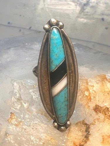 NAVAJO LONG RING TURQUOISE ONYX MOP SIZE 6.5 STERLING SILVER WOMEN: NAVAJO LONG RING TURQUOISE ONYX MOP SIZE 6.5 STERLING SILVER WOMEN Navajo long ring turquoise onyx mop size 6.5 sterling silver women Size 6.5 Weight 7.6g Length 1 7/8" Width 5/8" Thinnest part of ban
