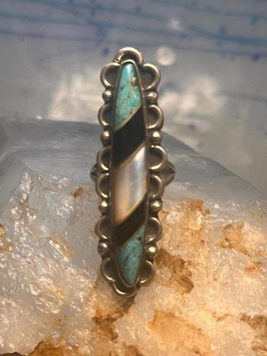 NAVAJO LONG RING TURQUOISE ONYX MOP SIZE 5.75 SCALLOPED STERLING SILVER WOMEN: NAVAJO LONG RING TURQUOISE ONYX MOP SIZE 5.75 SCALLOPED STERLING SILVER WOMEN Navajo long ring turquoise onyx mop size 5.75 sterling silver women Size 5.75 Weight 8.6g Length 2" Width 5/8" Thinnest pa