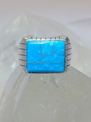BLUE RING SIZE 8.75 STERLING SILVER BAND SOUTHWEST: BLUE RING SIZE 8.75 STERLING SILVER BAND SOUTHWEST Blue ring sterling silver band southwest Size 8.75 Between a size 8.75 and a size 9 Weight 10.3g Length. 1/2" Width 5/8" Thinnest part of band 1/8"