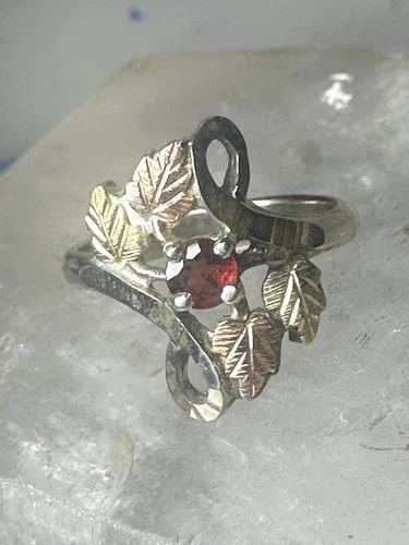 BLACK HILLS GOLD RING SIZE 5.75 GARNET LEAVES STERLING SILVER WOMEN GIRLS: BLACK HILLS GOLD RING SIZE 5.75 GARNET LEAVES STERLING SILVER WOMEN GIRLS Black Hills Gold ring size 5.75 garnet leaves sterling silver women girls 12K over sterling silver on the leaves Size 5.75 Wei