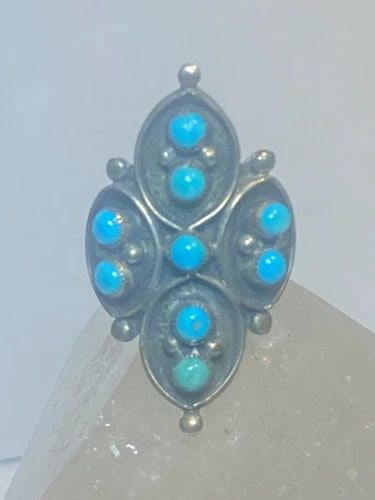 TURQUOISE RING ZUNI BAND PETITE POINT SOUTHWEST STERLING SILVER WOMEN GIRLS: TURQUOISE RING ZUNI BAND PETITE POINT SOUTHWEST STERLING SILVER WOMEN GIRLS Turquoise ring Petite Point band southwest sterling silver women girls Size 7.25 Weight. 4.1g Length 1. 3/8" Width. 9/32" Th