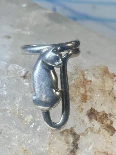 CAT RING HANGING KITTEN SIZE 4.50 PINKY STERLING SILVER WOMEN GIRLS: CAT RING HANGING KITTEN SIZE 4.50 PINKY STERLING SILVER WOMEN GIRLS Cat ring hanging kitten size 4.50 pinky Sterling silver women girls Size 4.50 Weight. 7.8g Length. 1" Width 1" Thinnest part of band