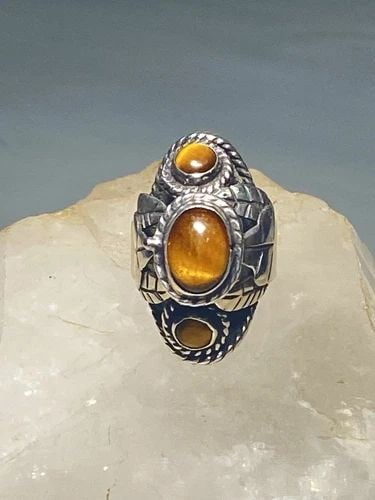 POISON RING SIZE 8 TIGER EYE MEXICO LEAF STERLING SILVER WOMEN: POISON RING SIZE 8 TIGER EYE MEXICO LEAF STERLING SILVER WOMEN Poison ring tiger eye Mexico leaf sterling silver women Size 8 adjustable Weight 11.9g Widest part of ring 1. 1/4" Thinnest part of band 