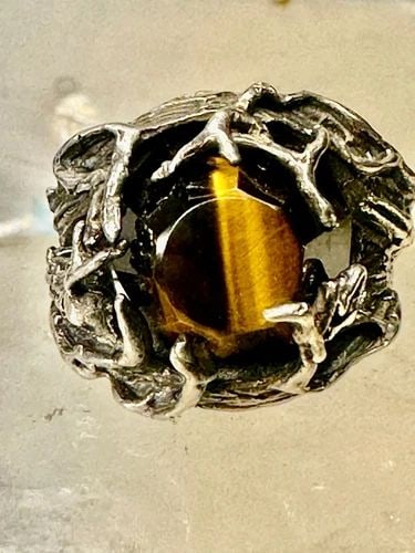 BRUTALIST RING TIGER EYE SIZE 4.75 HEAVY STERLING SILVER WOMEN: BRUTALIST RING TIGER EYE SIZE 4.75 HEAVY STERLING SILVER WOMEN Brutalist ring Tiger eye size 4.75 heavy sterling silver women Size. 4.75 Between a size 4.75 and a size 5 Weight 16g Length. 3/4" Width 