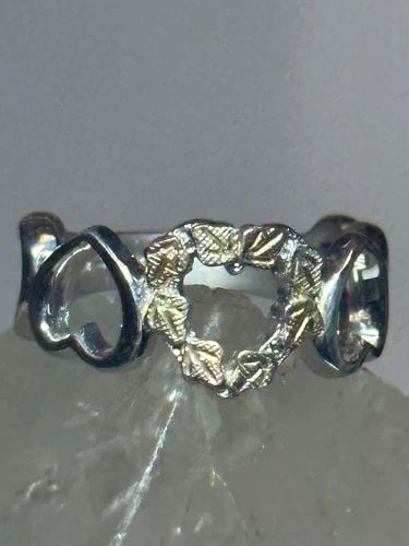 BLACK HILLS GOLD RING SIZE 4.75 HEART VALENTINE BAND STERLING SILVER WOMEN: BLACK HILLS GOLD RING SIZE 4.75 HEART VALENTINE BAND STERLING SILVER WOMEN Black Hills Gold ring size 4.75 Heart Valentine band sterling silver women I leave the rings unpolished until I sell .. If th
