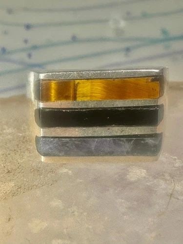 MEXICO RING TIGER EYE SIZE 9.75 INLAID STERLING SILVER MEN WOMEN: MEXICO RING TIGER EYE SIZE 9.75 INLAID STERLING SILVER MEN WOMEN Mexico ring tiger eye size 9.75 inlaid sterling silver men women Size 9.75 Weight 15.9g Length 1/2" Width 5/8" Thinnest part of band 7/