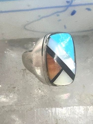 ZUNI RING MOTHER OF PEARL TURQUOISE INLAID BAND ONYX SIZE 7 STERLING SILVER WOME: ZUNI RING MOTHER OF PEARL TURQUOISE INLAID BAND ONYX SIZE 7 STERLING SILVER WOME Zuni ring Mother of Pearl Turquoise inlaid band onyx size 7 sterling silver women Size 7 Weight 7.3g Length. 5/8" Wides