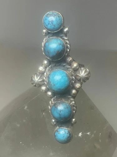 LONG TURQUOISE RING SOUTHWEST STERLING SILVER WOMEN GIRLS: LONG TURQUOISE RING SOUTHWEST STERLING SILVER WOMEN GIRLS Long Turquoise ring southwest sterling silver women girls Size 6.75 Weight 12g Length. 2" Widest part 7/8" Thinnest part 1/8"