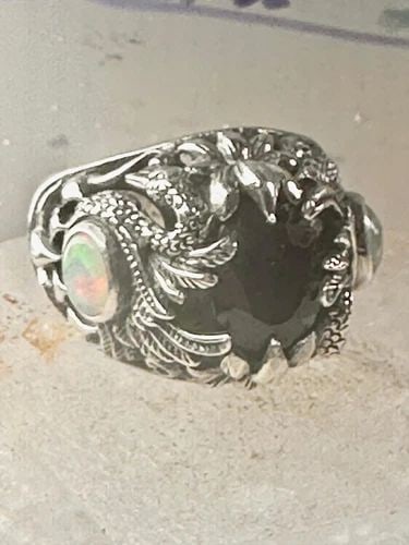 SWAN RING BIRD BAND LAB OPAL BLUE GLASS SIZE 6 STERLING SILVER WOMEN: SWAN RING BIRD BAND LAB OPAL BLUE GLASS SIZE 6 STERLING SILVER WOMEN Swan ring bird band lab opal blue glass size 6 sterling silver women Size 6 Weight 10.8g Width 1/8" Thinnest part of band 3/16"