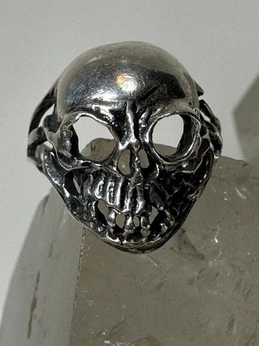 SKULL RING SIZE 6.75 STERLING SILVER BIKER WOMEN GIRLS: SKULL RING SIZE 6.75 STERLING SILVER BIKER WOMEN GIRLS Skull ring size 6.75 sterling silver biker women girls AS IS - The small band on the side is cut.. Wearable as is but a trip to the jewelers woul