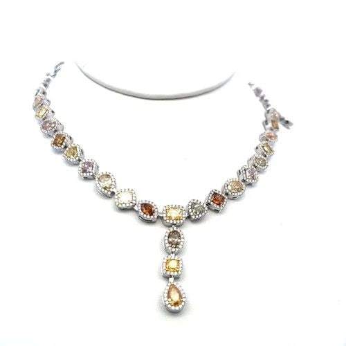 13.59CT MULTI-COLOR OVAL & ROUND DIAMOND 18K WHITE GOLD VINTAGE LINK NECKLACE: 13.59CT MULTI-COLOR OVAL & ROUND DIAMOND 18K WHITE GOLD VINTAGE LINK NECKLACE Title: This striking vintage 18K white gold link necklace features a dazzling 13.59 total carats of diamonds arranged in a