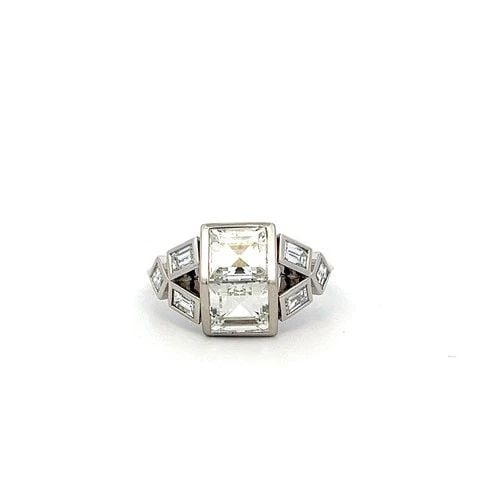 PLATINUM TWO-STONE RING WITH 3.85 CT EMERALD & ASSCHER CUT DIAMONDS G-VVS1 GIA: PLATINUM TWO-STONE RING WITH 3.85 CT EMERALD & ASSCHER CUT DIAMONDS G-VVS1 GIA Detailed Description: Elevate any occasion with this stunning vintage and estate platinum ring, perfect for those who che
