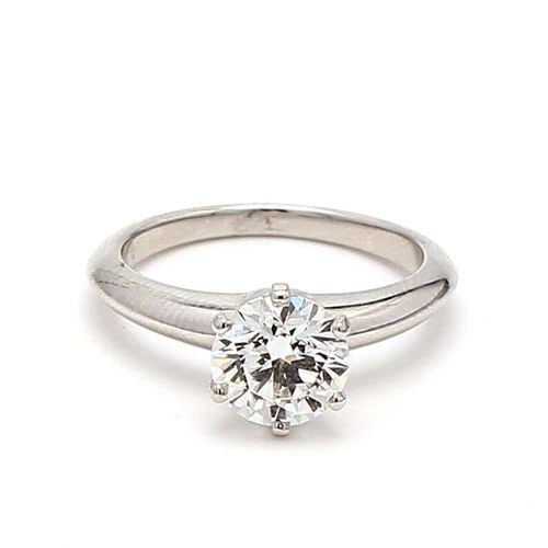 TIFFANY & CO.. 1.33 CARAT G-VS1 DIAMOND PLATINUM ENGAGEMENT RING: TIFFANY & CO.. 1.33 CARAT G-VS1 DIAMOND PLATINUM ENGAGEMENT RING Title: Tiffany and Co 1.33 Carat Round Brilliant Shape G-VS1 Diamond Platinum Engagement Ring Style: Engagement Metal: Platinum Gemston