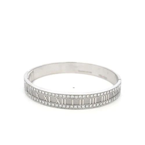 TIFFANY & CO 18K WHITE GOLD ATLAS BANGLE BRACELET WITH 2.5 CARAT ROUND DIAMONDS: TIFFANY & CO 18K WHITE GOLD ATLAS BANGLE BRACELET WITH 2.5 CARAT ROUND DIAMONDS TIFFANY & CO 18K WHITE GOLD ATLAS BANGLE BRACELET WITH 2.5 CARAT ROUND DIAMONDS PRODUCT DESCRIPTION Designer: Tiffany & 