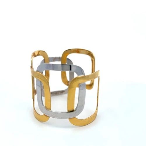 VINTAGE 18 KARAT TWO TONE GOLD WIDE OPENWORK GEOMETRIC CUFF BRACELET: VINTAGE 18 KARAT TWO TONE GOLD WIDE OPENWORK GEOMETRIC CUFF BRACELET VINTAGE 18 KARAT TWO TONE GOLD WIDE OPENWORK GEOMETRIC CUFF BRACELET PRODUCT DESCRIPTION Detailed Description: 39.4 Grams Style: Cu