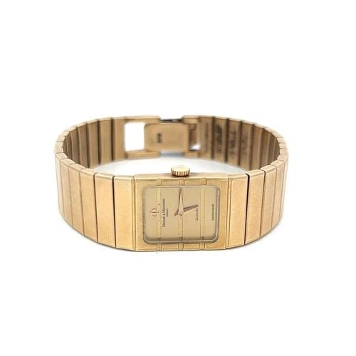 BAUME & MERCIER VINTAGE 41.44 GRAMS 14 KARAT YELLOW GOLD WRIST WATCHES: PRODUCT DESCRIPTION Designer: BAUME & MERCIER Title: Baume & Mercier 18 Karat Yellow Gold Wrist Watches Style: Wrist Metal: 14 Karat Yellow Gold Dimension: 6.5* Weight: 41.44 Grams Condition: Vintage 