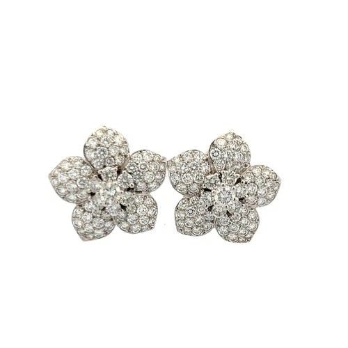 VINTAGE 18K WHITE GOLD CLIP-ON EARRINGS WITH 4 CARAT ROUND DIAMONDS: VINTAGE 18K WHITE GOLD CLIP-ON EARRINGS WITH 4 CARAT ROUND DIAMONDS Detailed Description: Vintage Clip-On Earrings 18K White Gold 4 Carat Diamond Floral DESCRIPTION: Embrace the timeless allure of the