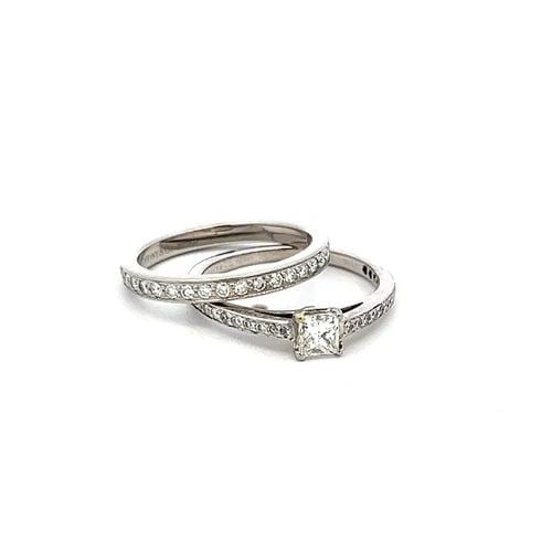 TIFFANY & CO 0.83 CARAT ROUND AND PRINCESS CUT DIAMOND PLATINUM ENGAGEMENT RING: TIFFANY & CO 0.83 CARAT ROUND AND PRINCESS CUT DIAMOND PLATINUM ENGAGEMENT RING TIFFANY & CO 0.83 CARAT ROUND AND PRINCESS CUT DIAMOND PLATINUM ENGAGEMENT RING $5,400.00 PRODUCT DESCRIPTION Designer: 