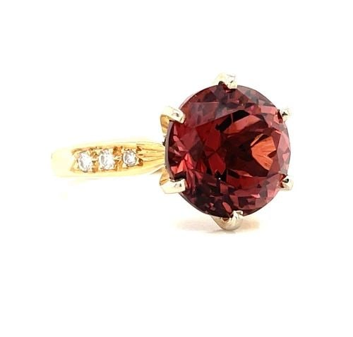 5.00CT PINK TOURMALINE RING IN 14K YELLOW GOLD WITH DIAMOND ACCENT: 5.00CT PINK TOURMALINE RING IN 14K YELLOW GOLD WITH DIAMOND ACCENT This stunning 14K yellow gold ring features a gorgeous 5 00ct round pink tourmaline, surrounded by six natural diamonds set in a pron