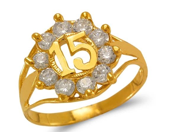 NEW 14K YELLOW GOLD LADIES 15 ANOS RING: NEW 14K YELLOW GOLD LADIES 15 ANOS RING LADIES 15 ANOS RING NEW 14K YELLOW GOLD Apx. WIDTH: 13.5mm Apx. WEIGHT: 2.2g